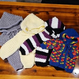 Set Of 4 Colorful Hand-Knit Baby Sweaters